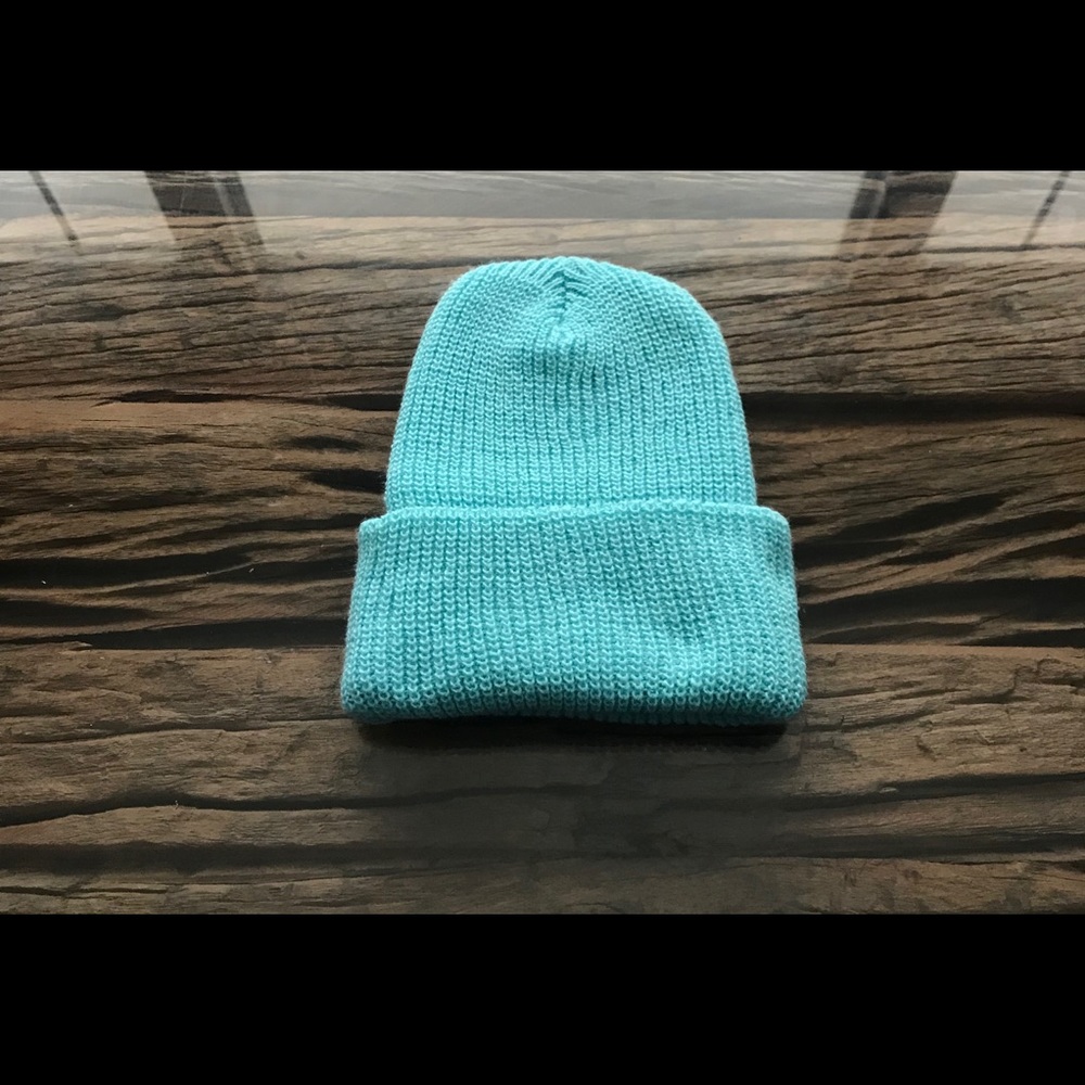 Winter hat. Sky blue color. Knitted hat.